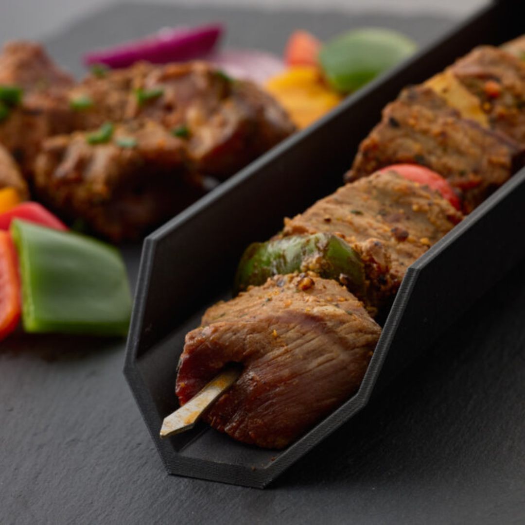 Tire brochette pour barbecue